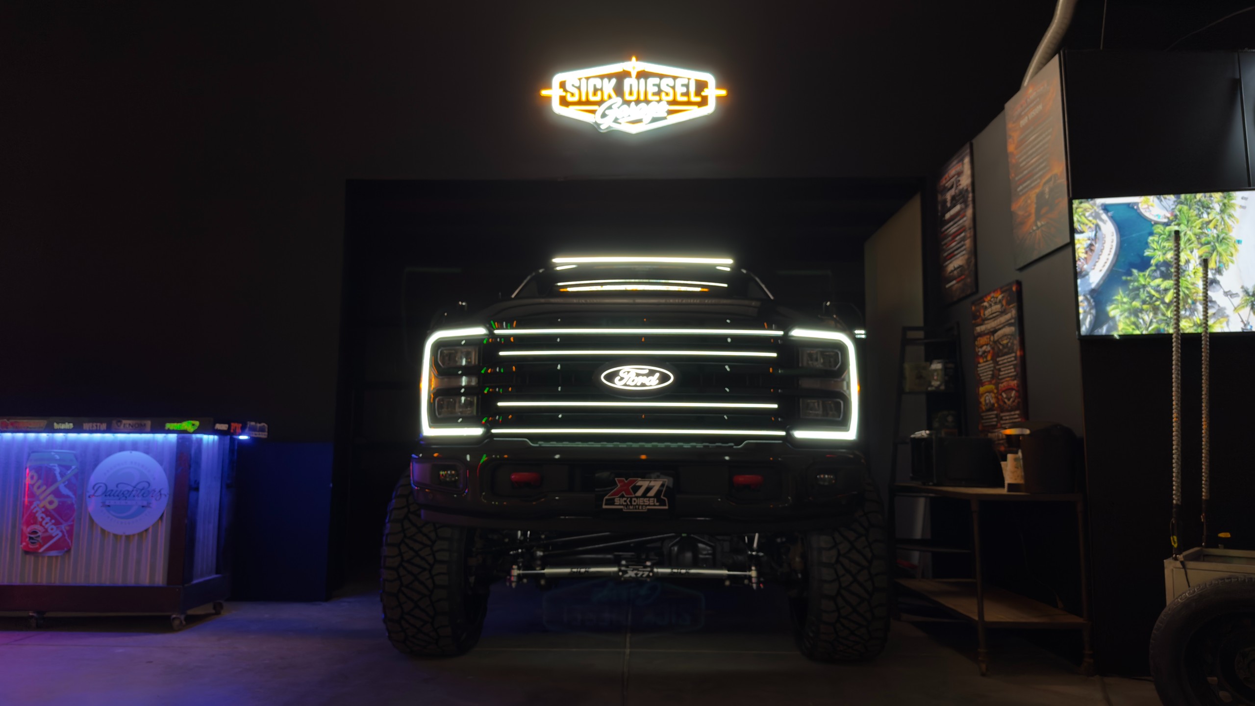 X77 illuminated grille under the Sick Diesel Garage neon