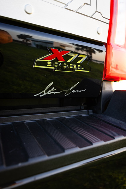 Signed X77 badge